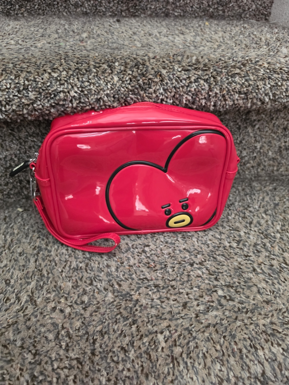 BT21 Tata Enamel Cosmetic Bag featuring the heart-shaped character Tata
